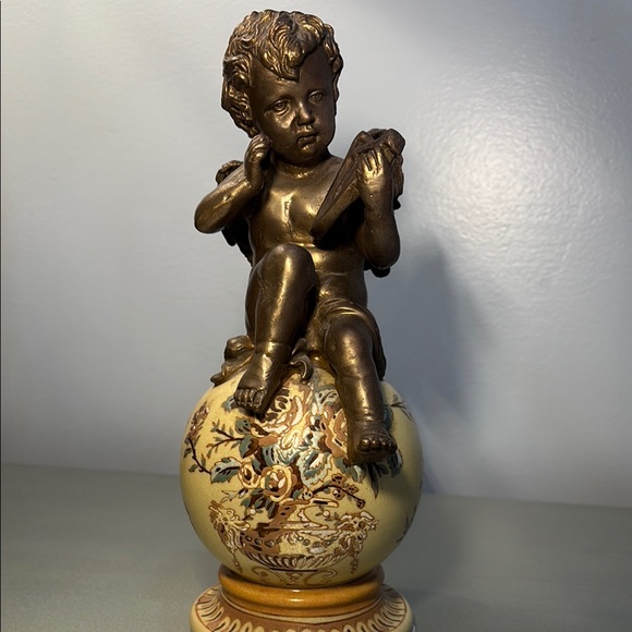 Bronze Cherub Putti Sculpture on Ornate Cream Globe